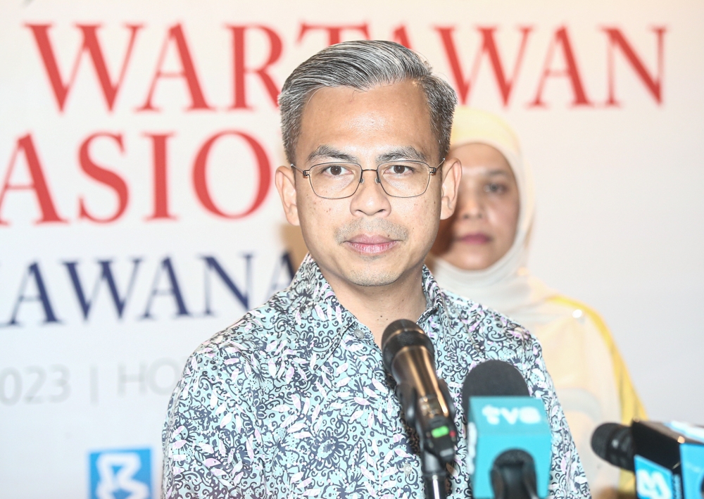 Communications and Digital Minister Fahmi Fadzil speaks to reporters at the National Journalists’ Day (Hawana) 2023 summit at the Casuarina Convention Centre in Ipoh May 28, 2023. — Picture by Farhan Najib