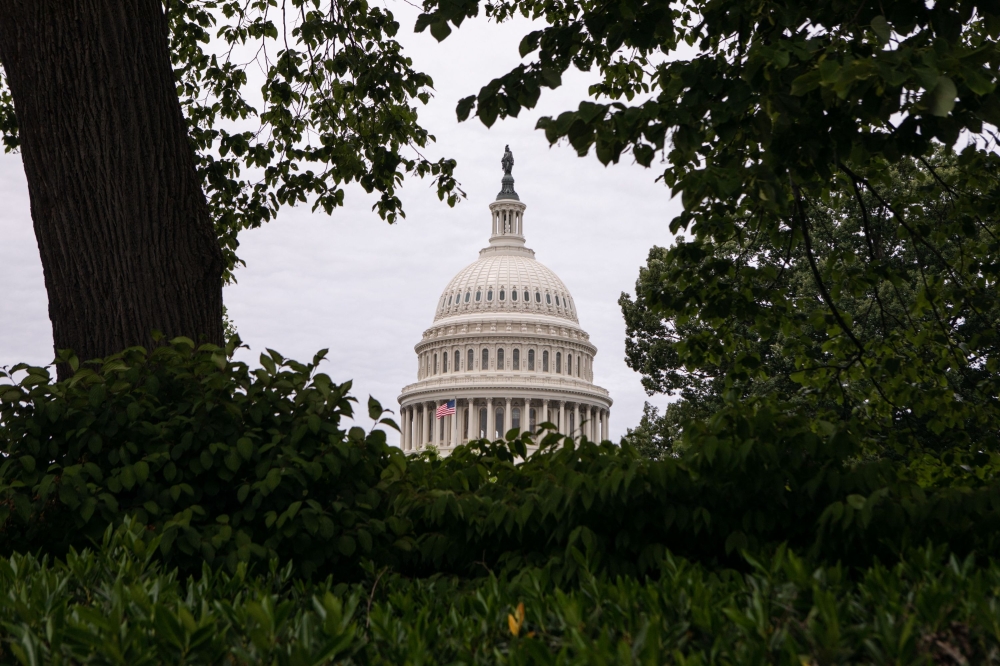 The bill hammered out by US leaders to prevent the country from a catastrophic default on its debts will face one last hurdle this week: Passing Congress. — AFP pic
