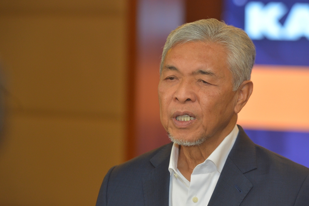 Datuk Seri Ahmad Zahid Hamidi speaks to reporters after chairing the Committee Meeting of Sports Development Cabinet at the Prime Minister’s Department in Putrajaya May 30, 2023. ― Picture by Shafwan Zaidon