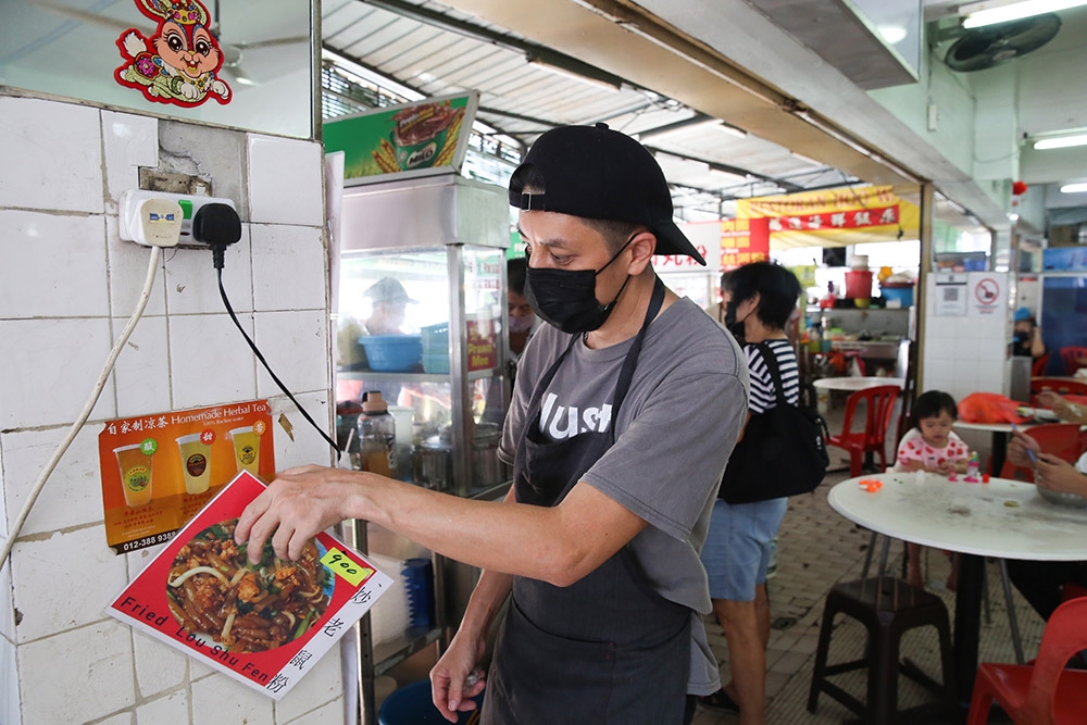 ‘Char kway teow’ stall owner Chan is packing as he will close on May 31 and relocate to Restoran SS2 Rising Kopitiam.
