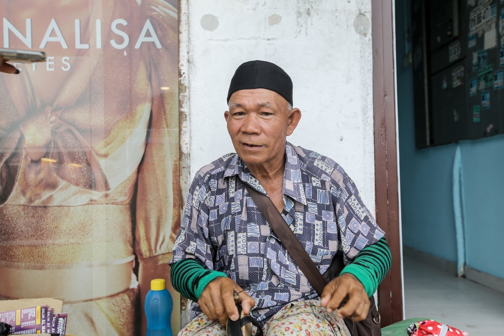 Dukung Abdul Kadir said 17 years ago, when his children renovated and replaced his wooden house with bricks, he never thought he would be missing the clean and cooling air he gets without having to turn on the fan. — Picture by Ahmad Zamzahuri
