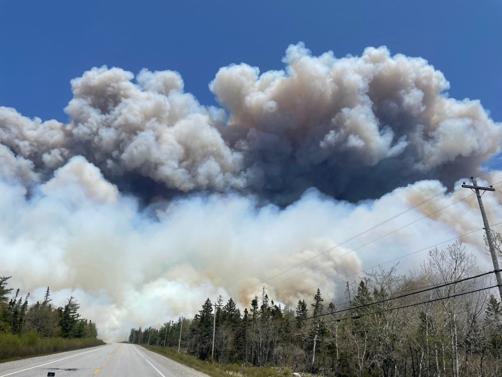 Firefighters faced a gruelling uphill battle against wildfires in Canada’s Nova Scotia province. — AFP pic/Nova Scotia Government/Department of Natural Resources and Renewables