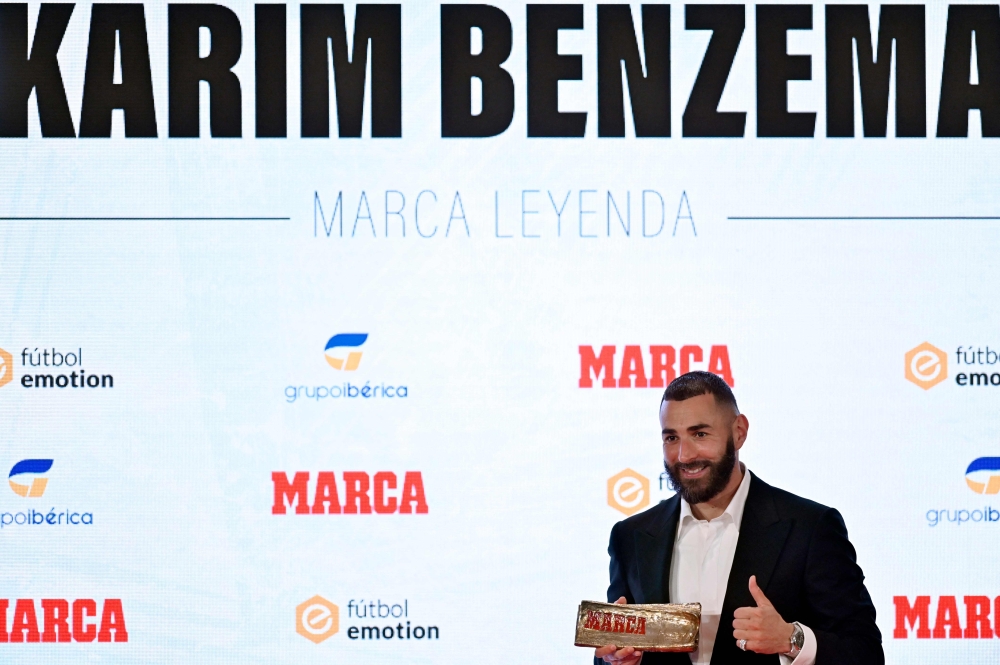 Real Madrid's French forward Karim Benzema poses after receiving the MARCA Leyenda (MARCA Legend) award in Madrid on June 1, 2023. — AFP pic