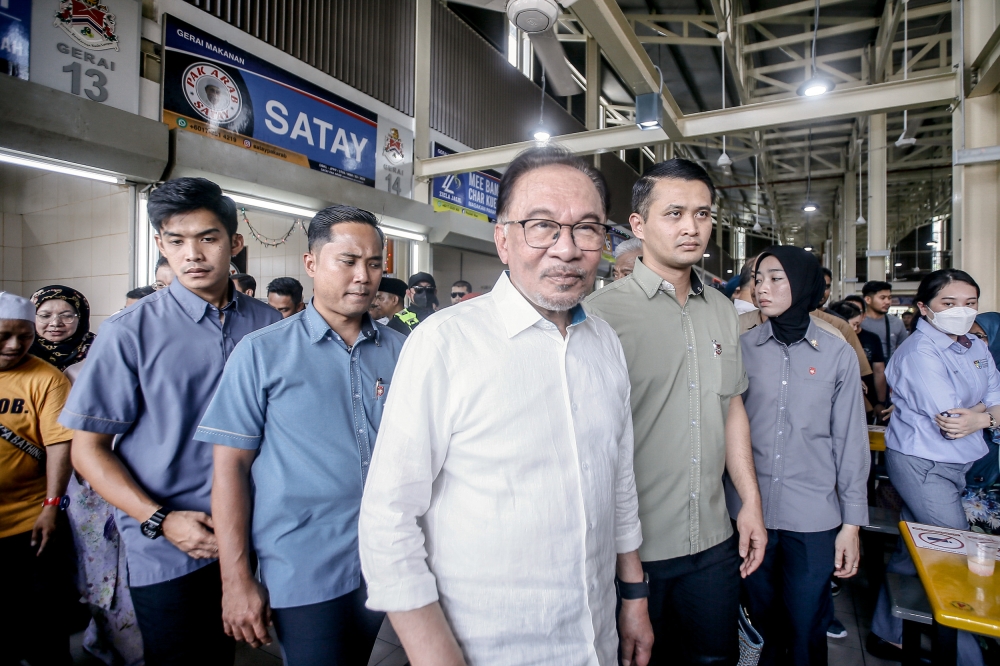 Humility can be instilled from young if children were taught how to clean toilets, Prime Minister Datuk Seri Anwar Ibrahim said today. — Picture by Hari Anggara