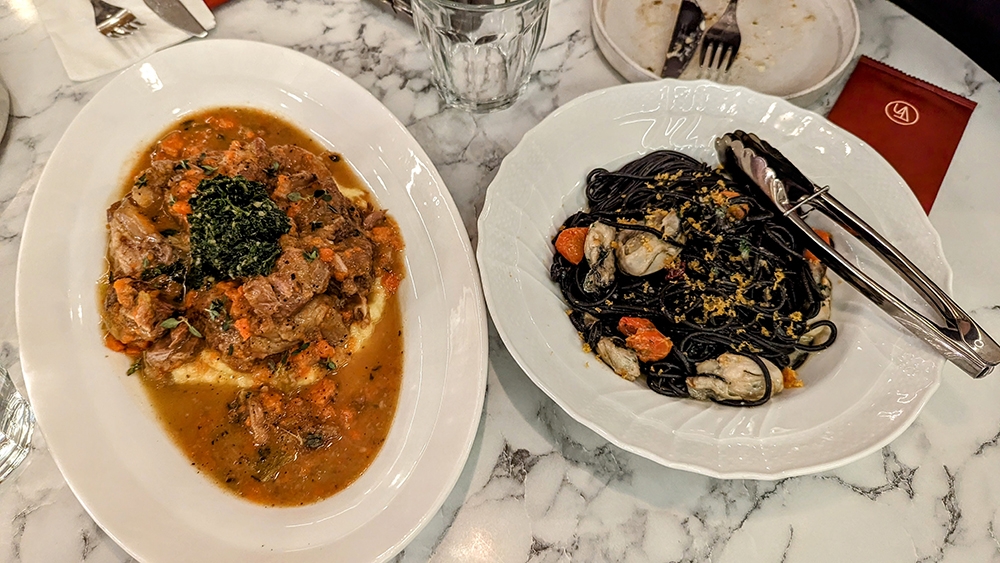 From the left: TTR Ossobuco and Aglio Olio Squid Ink Tagliolini With Japanese Oyster at Taverna. – Pictures by Ethan Lau