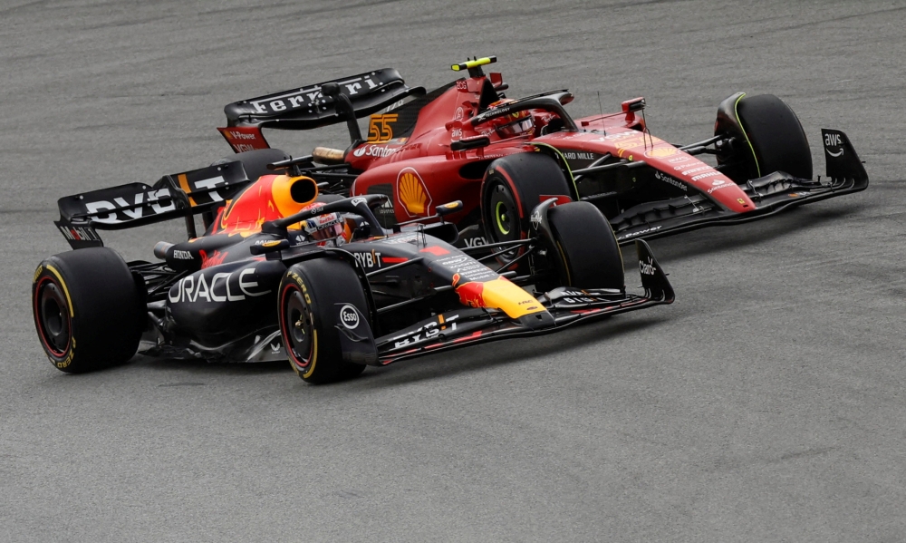 Red Bull’s Max Verstappen in action as he leads into the first corner at start of the race ahead of Ferrari’s Carlos Sainz Jr at the Circuit de Barcelona-Catalunya, Barcelona, Spain, June 4, 2023. — Reuters pic 