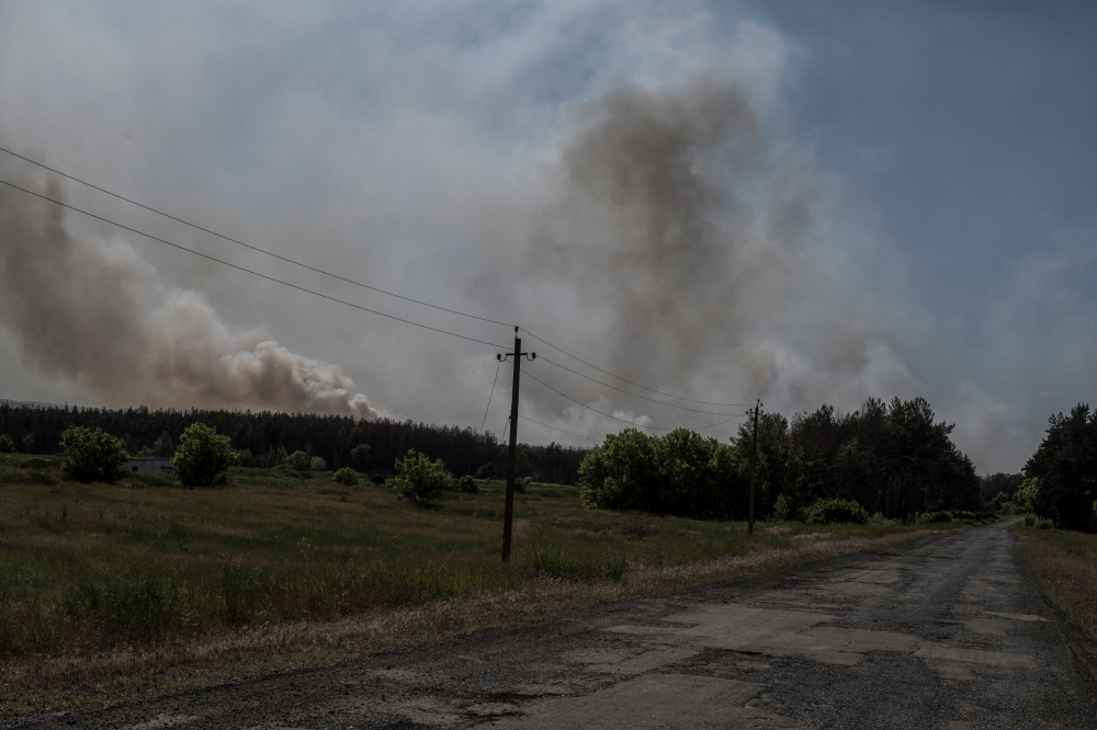 Smoke rises over an area of the Ukraine-Russia border, amid Russia's attack on Ukraine, in Kharkiv region, Ukraine, June 4, 2023. — Reuters pic