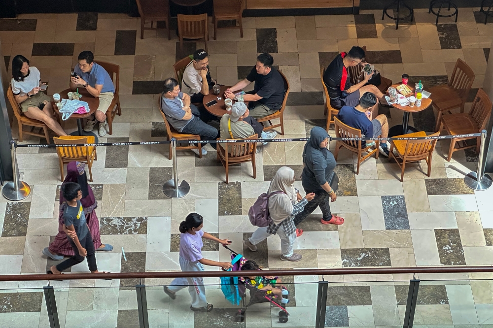 People dine in at Publika Shopping Gallery in Solaris Dutamas, Kuala Lumpur, May 28, 2023. — Picture by Shafwan Zaidon