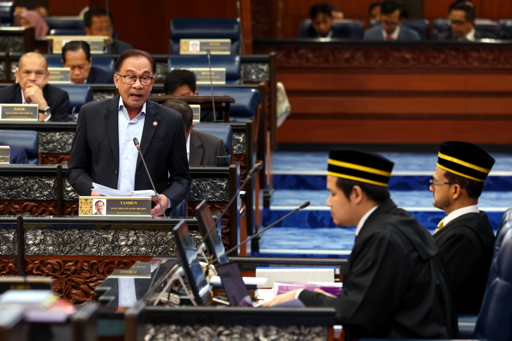 Prime Minister Datuk Seri Anwar Ibrahim speaks at the Parliament in Kuala Lumpur June 6, 2023. — Bernama pic