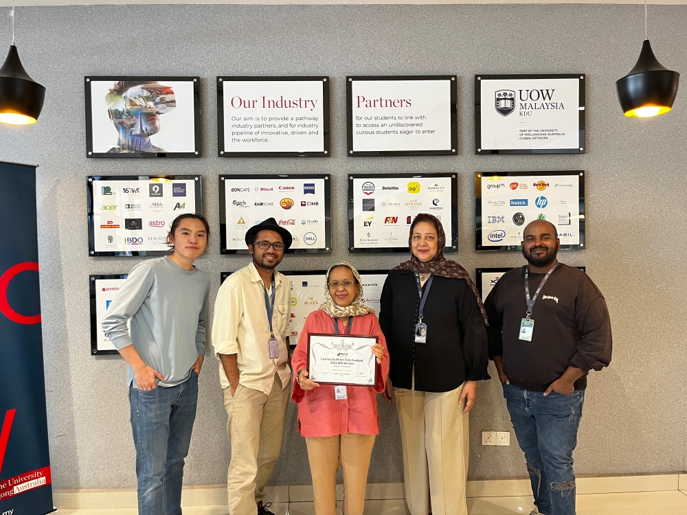Production team members of ‘People of the Forest’ Jordan Chang, Nawfal Zamri, Roselina Khir, Murina Pawanteh and John Stephen Moses receive the special jury award from Cannes Aviff Art Film Festivals 2023. — Picture courtesy of UOW Malaysia
