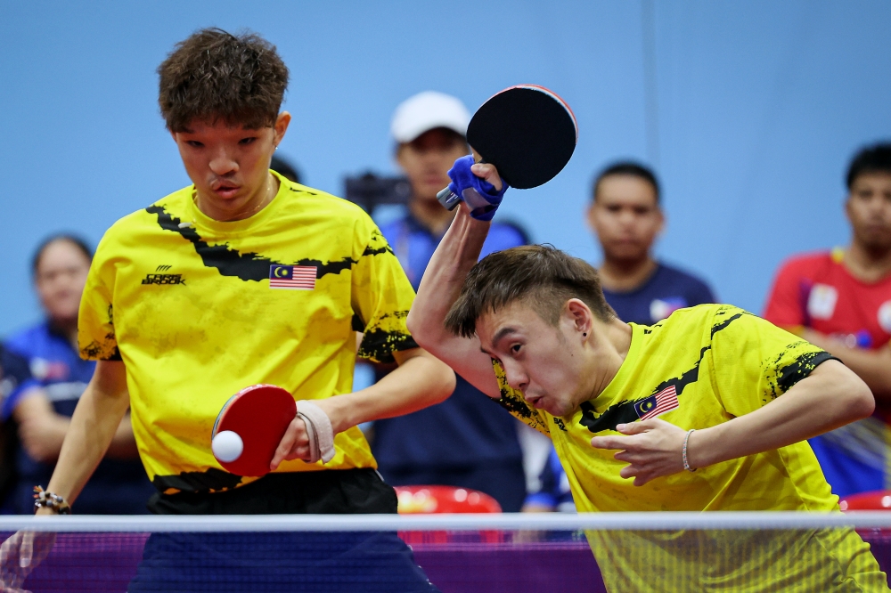 Chee Chaoming-Brady Chin clinched the 33rd gold medal through the men’s doubles table tennis competition for (Class 9-Mild Balance Disorder) after defeating Linard Combras-Benedicto Hernandez from the Philippines. ― Bernama pic