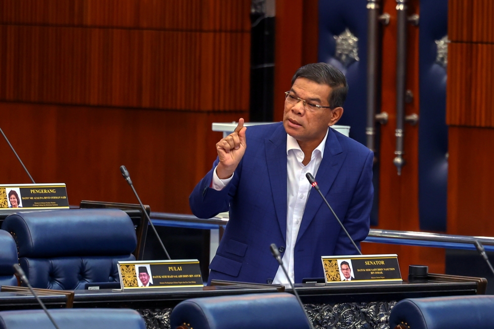 Home Minister Datuk Seri Saifuddin Nasution Ismail speaks at the Parliament in Kuala Lumpur June 7, 2023. — Bernama pic