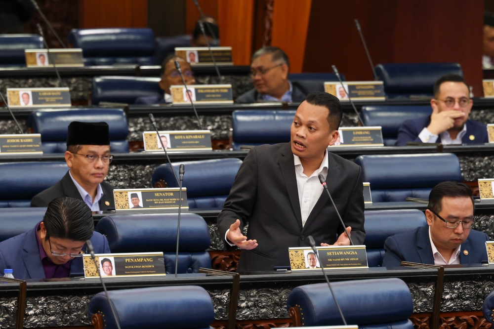 Natural Resources, Environment and Climate Change Minister Nik Nazmi Nik Ahmad speaks at the Dewan Rakyat, June 7, 2023. — Bernama pic 