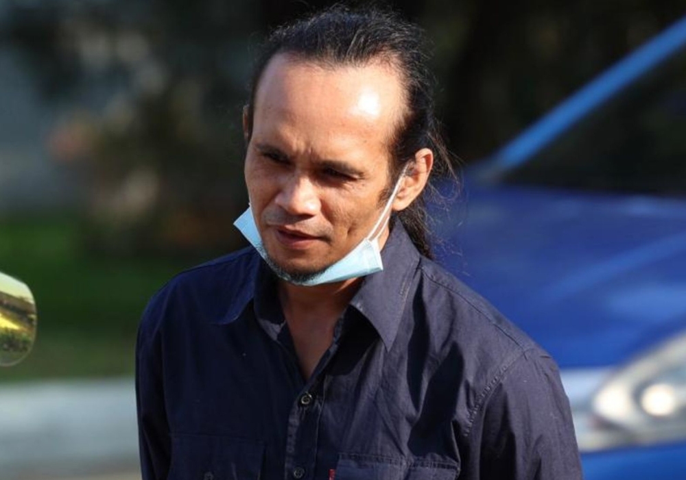 Alimuddin Mohd Hayat, 39, pleaded not guilty when six charges were read before Judge Datuk Ahmad Kamal Arifin Ismail and four charges before Judge V. M Mabel Sheela. — Picture from Twitter/Bernama 