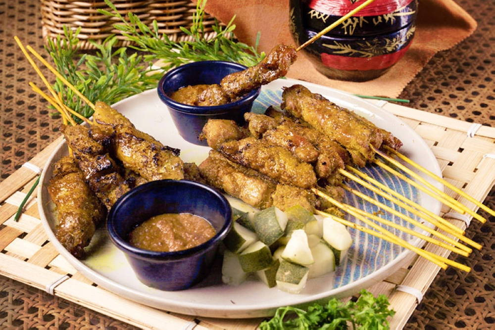 Kampung Dining’s signature Pork Satay with Pineapple Peanut Sauce. — Pictures courtesy of Kampung Dining