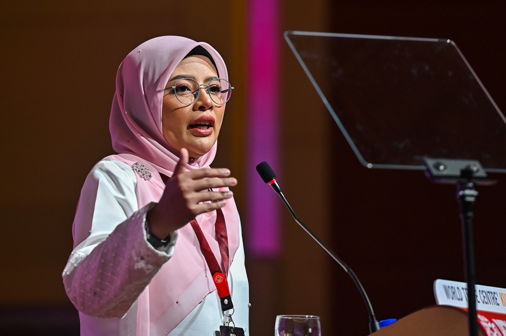Puteri Umno chief Nurul speaks during Umno's Annual General Meeting in Kuala Lumpur June 8, 2023. ― Picture by Miera Zulyana