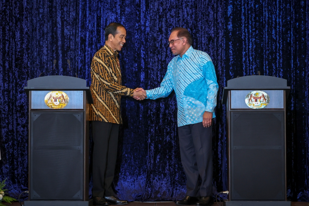 Indonesia’s President Joko Widodo, Prime Minister Datuk Seri Anwar Ibrahim at a joint press conference in Putrajaya June 8, 2023. — Bernama pic