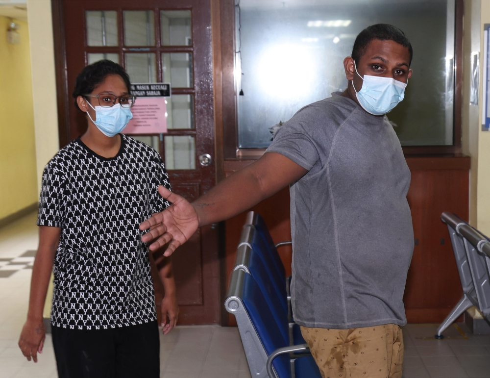 According to the new charge, to achieve a common end, both of them acted negligently and caused physical injury to the child under their care.— Bernama pic 