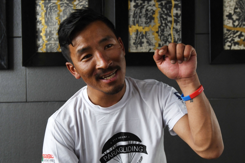 In this picture taken on June 2, 2023, Nepali guide Gelje Sherpa speaks during an interview with AFP in Kathmandu. Gelje abandoned his client's Everest summit bid to rescue a Malaysian climber in a deadly season that has seen at least twelve deaths. — AFP pic