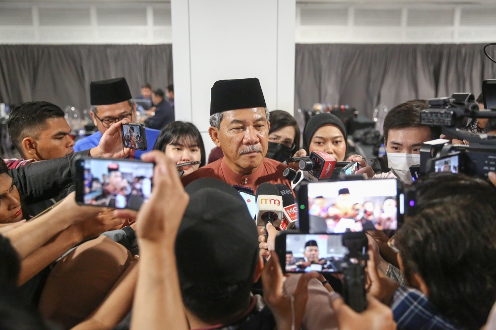 Umno deputy president Datuk Seri Mohamad Hasan speaks to reporters during the party's general assembly at World Trade Centre in Kuala Lumpur June 10, 2023. ― Picture by Yusof Mat Isa