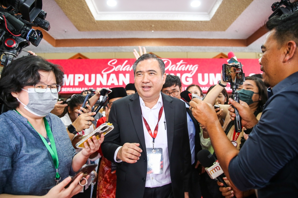 DAP secretary-general Anthony Loke leaves the 2023 Umno general assembly at the World Trade Centre in Kuala Lumpur June 9, 2023. — Picture by Yusof Mat Isa