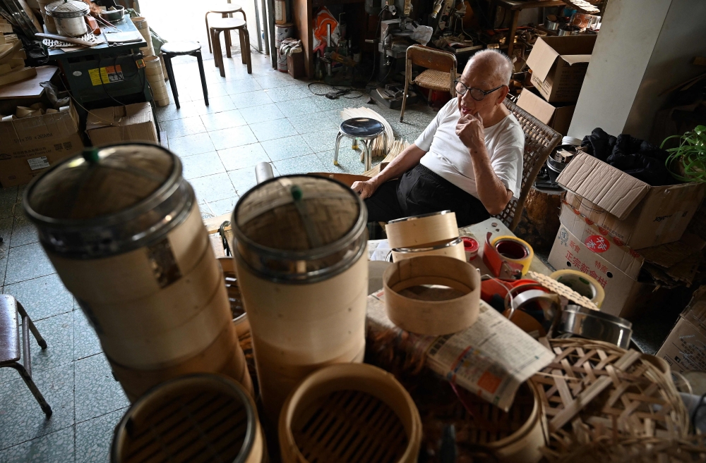 Lui Ming’s shop is located on Shanghai Street, a historic stretch of road in Hong Kong’s Kowloon district that is a treasure trove of kitchenware and utensils. — AFP pic 