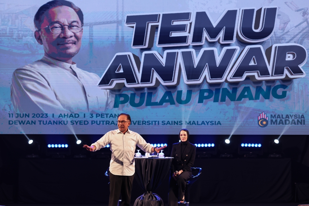 Prime Minister Datuk Seri Anwar Ibrahim speaks during a ‘Temu Anwar’ session at Universiti Sains Malaysia in George Town June 11, 2023. — Bernama pic