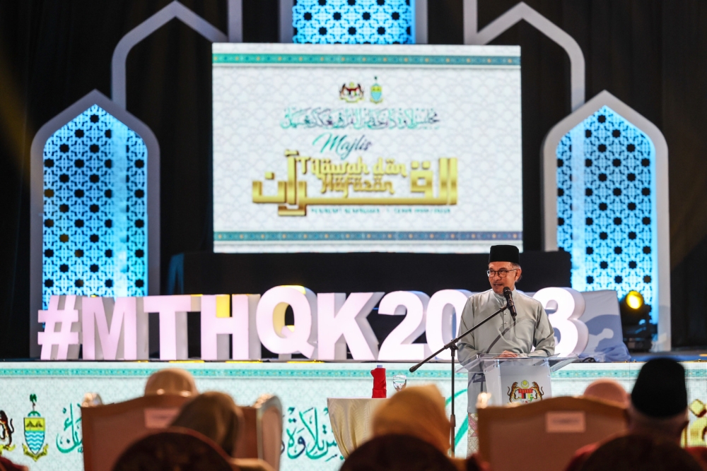 Prime Minister Datuk Seri Anwar Ibrahim gives a speech during the 1444H/2023 National Recitation and Al-Quran Memorisation Competition in Butterworth June 11, 2023. — Bernama pic