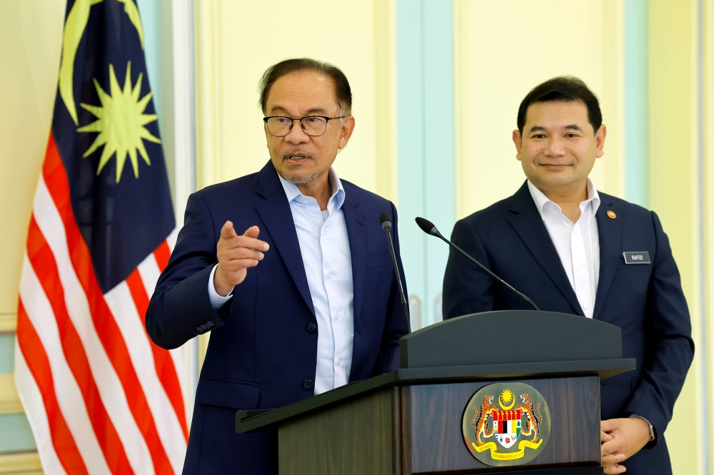 Prime Minister Datuk Seri Anwar Ibrahim speaks at a press conference after chairing a National Economic Action Council meeting in Putrajaya June 12, 2023. — Bernama pic