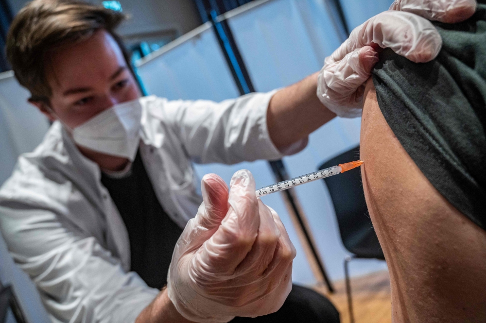 German courts from today will begin examining a series of claims over adverse effects suffered after coronavirus vaccinations. — AFP pic