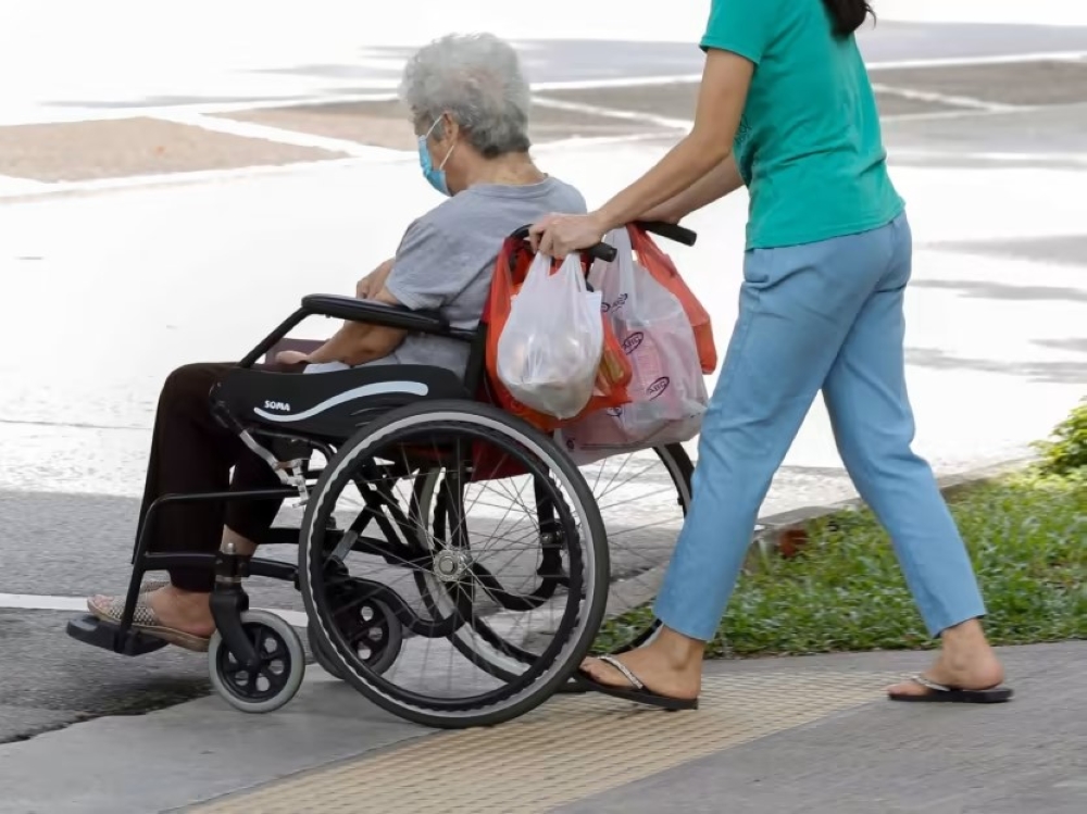 The Ministry of Manpower (MOM) is investigating a firm that provides assisted living services to seniors for potentially flouting foreign manpower laws over the employment of maids who look after its elderly clients. — TODAY pic