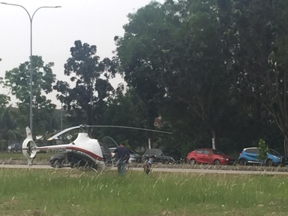 The helicopter that landed in Section U11 is currently under investigation by the Civil Aviation Authority of Malaysia. — Picture courtesy of the police