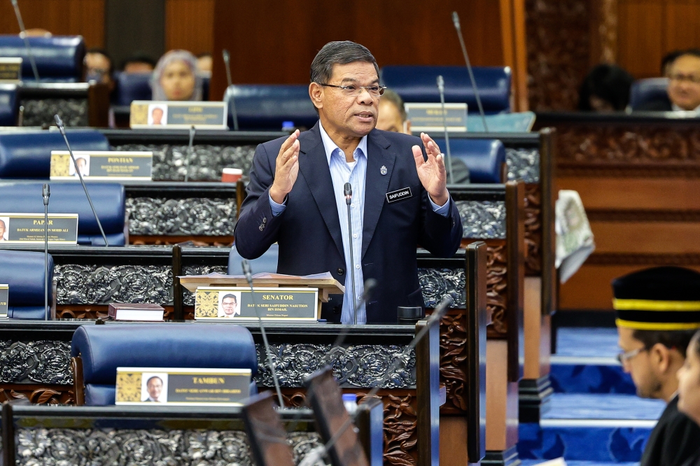 Home Minister Datuk SeriﾊSaifuddinﾊNasution Ismail during a question and answer session in  the Dewan Rakyat, June 14, 2023. — Bernama pic