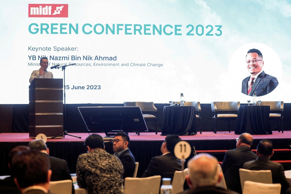 Natural Resources, Environment And Climate Change Minister Nik Nazmi Nik Ahmad speaks at the MIDF Green Conference 2023 in Kuala Lumpur June 15, 2023. — Bernama pic