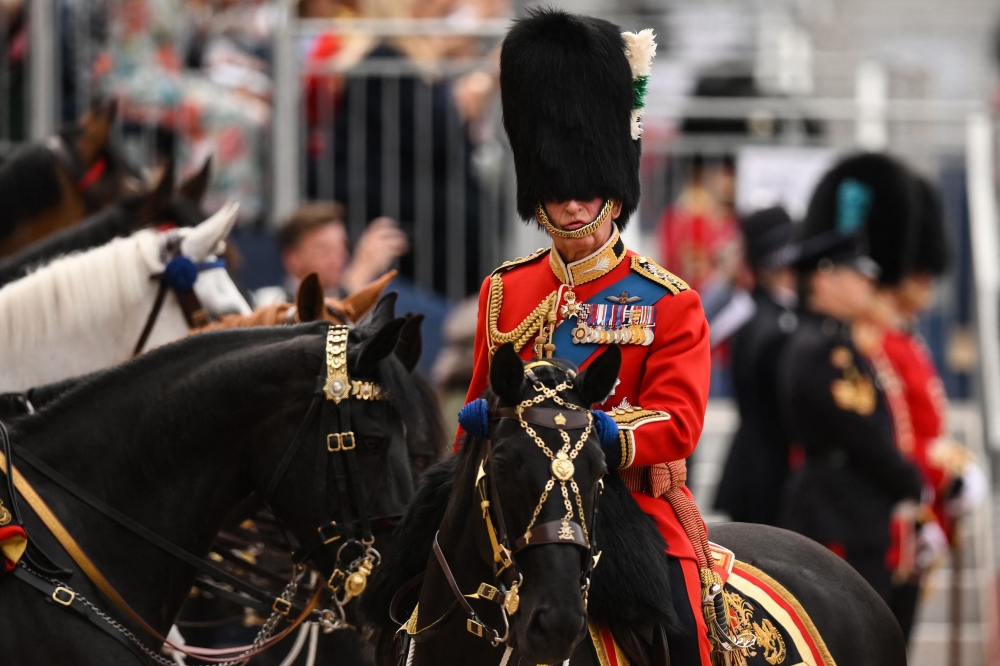 Britain's King Charles III arrives to review members of the Household Division on Horse Guards Parade during the King's Birthday Parade, 'Trooping the Colour', in London on June 17, 2023. — AFP pic