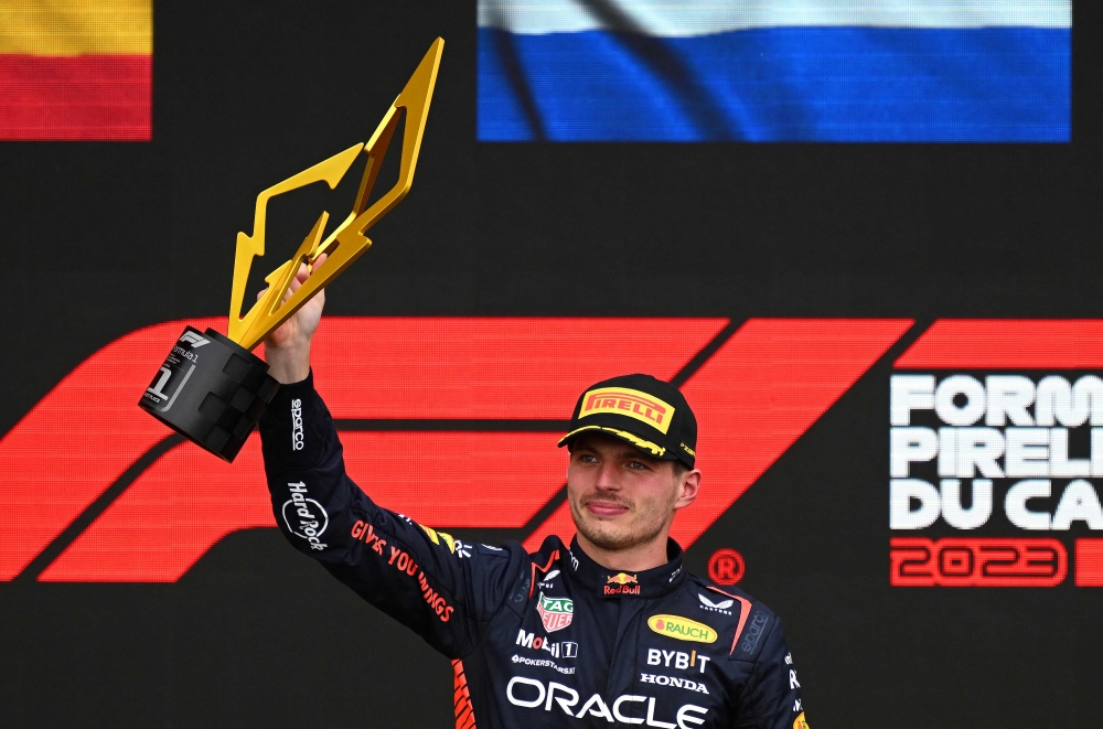 Race winner Max Verstappen of the Netherlands and Oracle Red Bull Racing celebrates on the podium during the F1 Grand Prix of Canada at Circuit Gilles Villeneuve in Montreal June 18, 2023. — Picture by Clive Mason/Getty Images via AFP