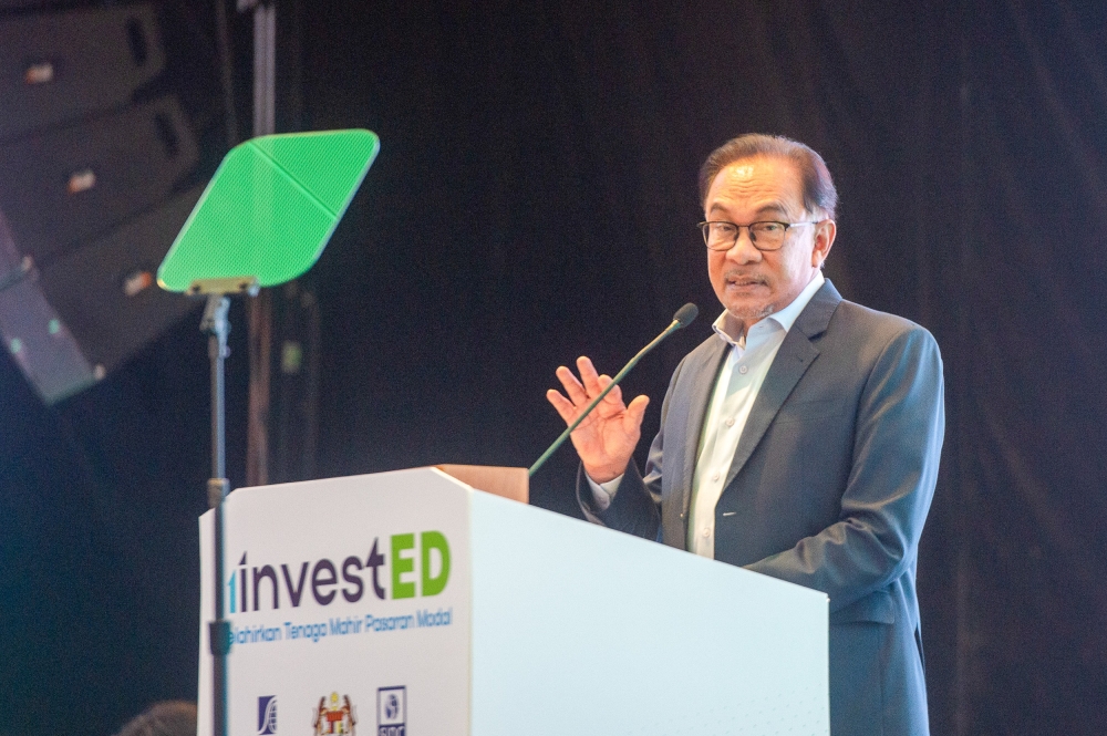 Prime Minister Datuk Seri Anwar Ibrahim delivers a speech at the launch of the Capital Market Graduate Programme at the Securities Commission in Kuala Lumpur, 19 June 2023. — Picture by Shafwan Zaidon
