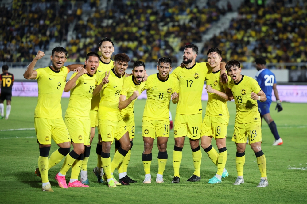 Harimau Malaya celebrate their win against Papua New Guinea at the Sultan Mizan Zainal Abidin Stadium in Kuala Nerus, June 20, 2023. — Bernama pic 
