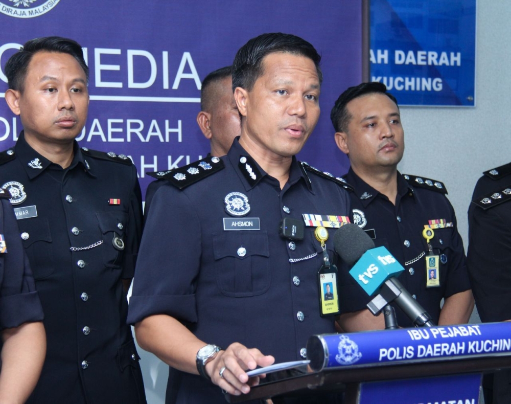 Kuching police chief ACP Ahsmon Bajah speaks at the press conference. — Borneo Post Online pic