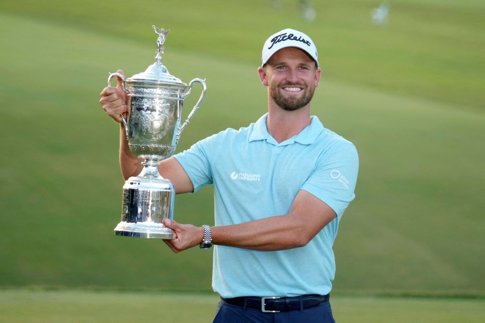Wyndham Clark poses with the championship trophy after winning the US Open golf tournament at Los Angeles Country Club in California June 18, 2023. — Picture by Michael Madrid-USA TODAY Sports via Reuters