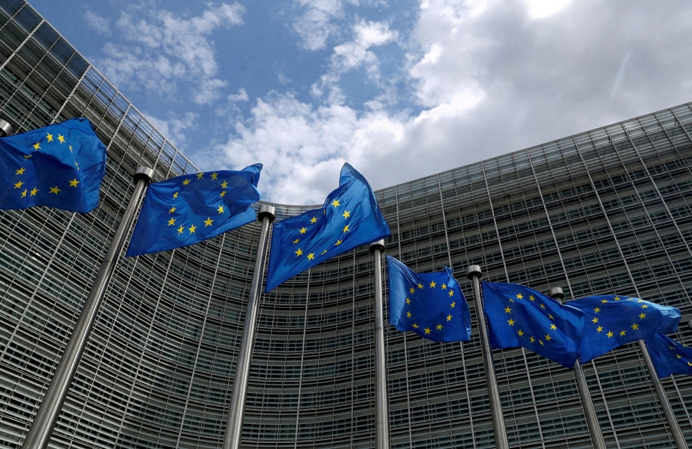 European Union flags flutter outside the European Commission headquarters in Brussels June 5, 2020. Russia said today it was barring entry to more European officials in response to the EU’s decision to slap new sanctions on Moscow over the conflict in Ukraine. — Reuters pic