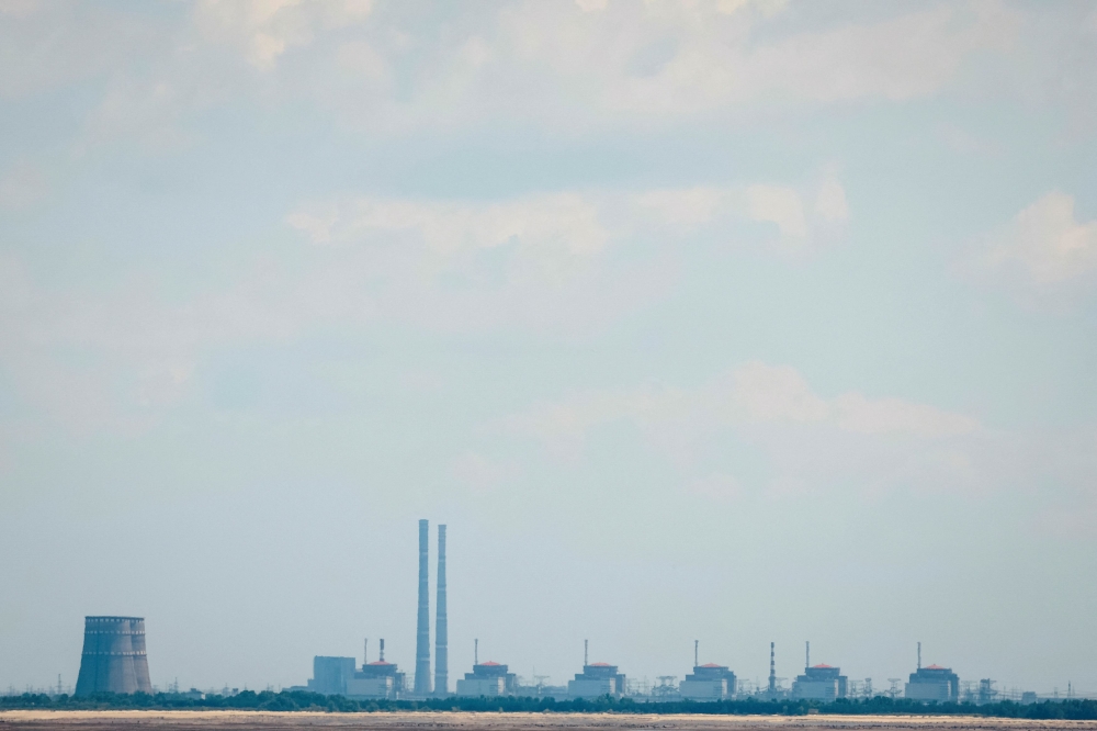 A view shows Zaporizhzhia Nuclear Power Plant from the bank of Kakhovka Reservoir near the town of Nikopol after the Nova Kakhovka dam breached, amid Russia's attack on Ukraine, in Dnipropetrovsk region, Ukraine June 16, 2023. — Reuters pic