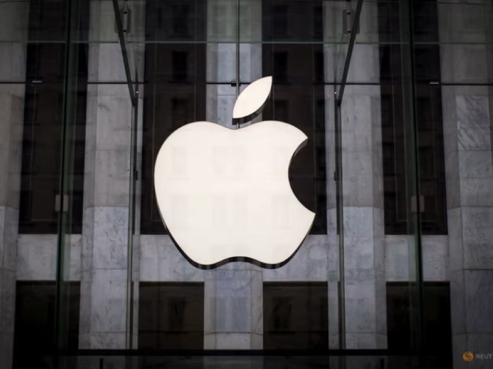 An Apple logo hangs above the entrance to the Apple store on 5th Avenue in the Manhattan borough of New York City, on July 21, 2015. ― Reuters pic