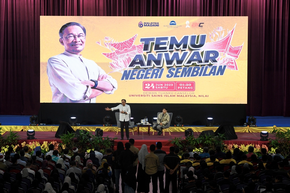 Prime Minister Datuk Seri Anwar Ibrahim speaks during a ‘Temu Anwar’ session at Universiti Sains Islam Malaysia in Nilai June 24, 2023. — Bernama pic