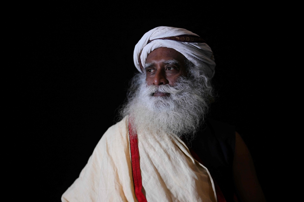 Indian mystic and author, founder and head of the Isha Foundation, Sadhguru (Jaggi Vasudev) poses during the International Day of Yoga at the Unesco headquarters in Paris on June 21, 2023. — AFP pic