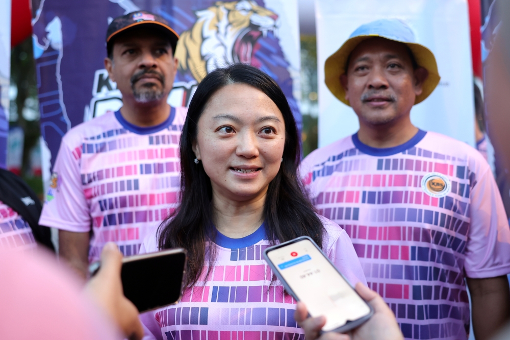 Youth and Sports Minister Hannah Yeoh speaks to reporters after launching the KBS x KL Car Free Morning programme in Kuala Lumpur June 25, 2023. — Bernama pic