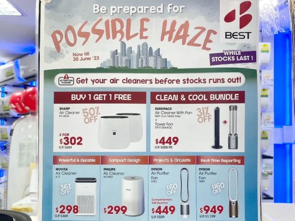 An advertisement promoting air purifiers at Best Denki's outlet in Junction 8 shopping mall. — TODAY pic