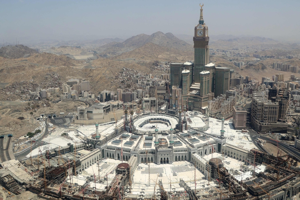 This aerial view shows Mecca’s Grand Mosque and its clock tower with the Kaaba, Islam’s holiest site in the centre. — AFP pic