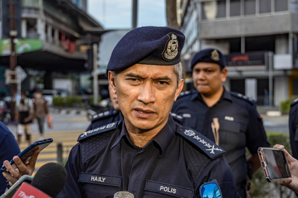 City police Chief Commissioner Datuk Mohd Shuhaily Mohd Zain speaks to reporters during the ‘Respecting Traffic Regulations Operation’ in Kuala Lumpur July 3, 2023. — Picture by Firdaus Latif