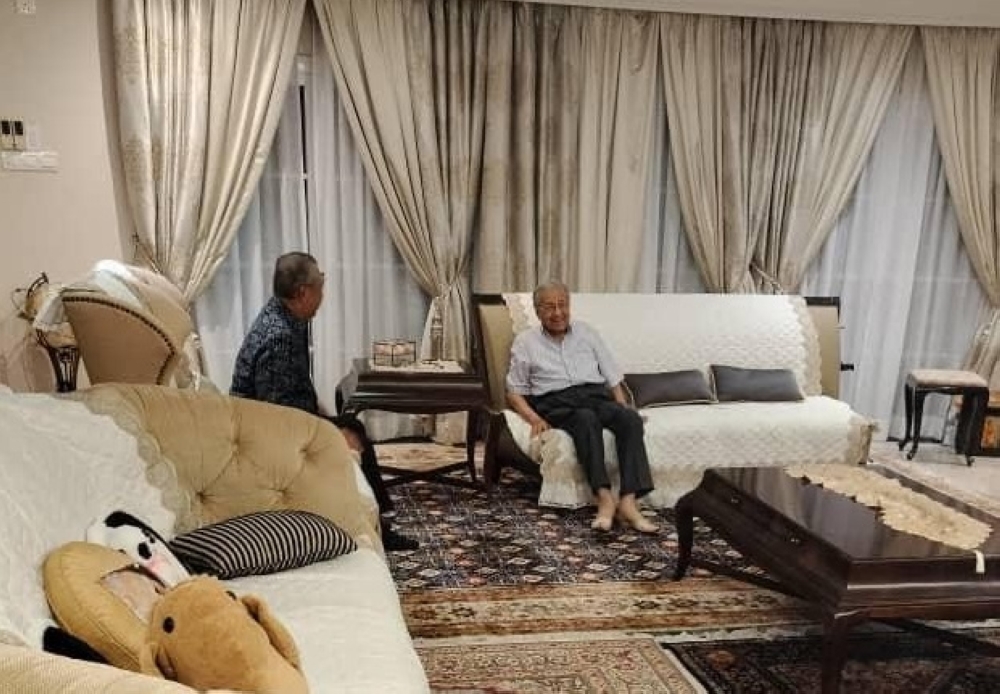 Tan Sri Muhyiddin Yassin (left) and Tun Dr Mahathir Mohamad at the meeting. — Picture by Datuk Seri Khairuddin Abu Hassan